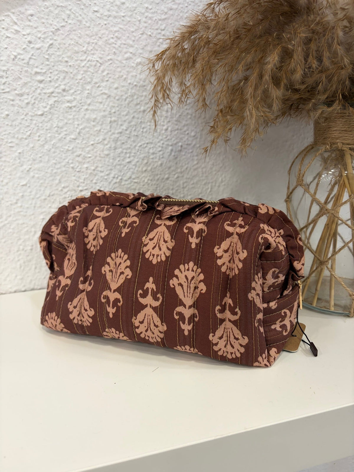 Neceser acolchado estampado floral marrón y rosa